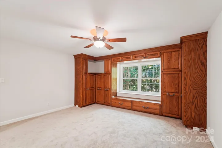 Master bedroom with custom oak cabinets