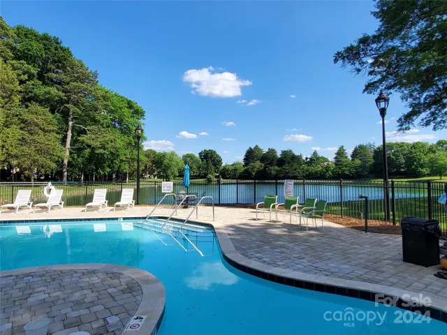 Adult Swimming Pool with lake in background