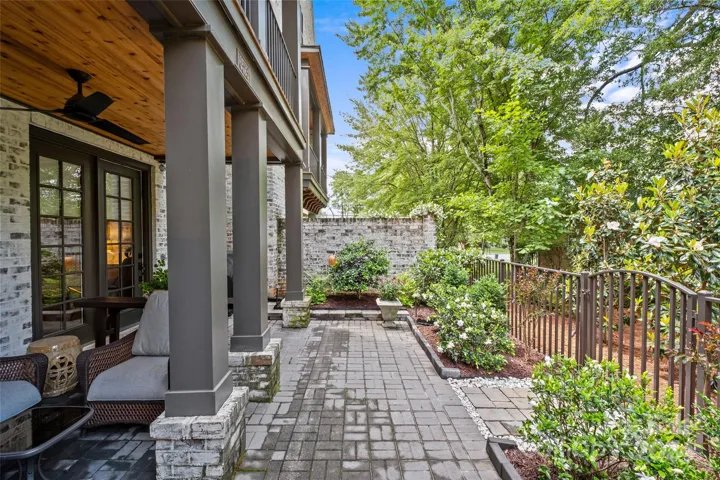 Lower patio fenced and landscaped