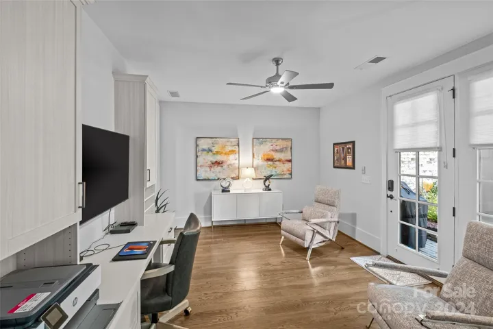 Lower den or office with doors to patio