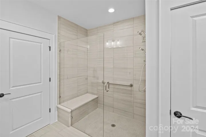 Tiled shower and heated flooring