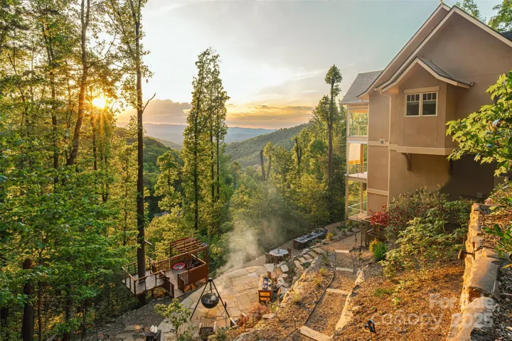 This Majestic Mountainside Masterpiece has epic outdoor living spaces with breathtaking views.
