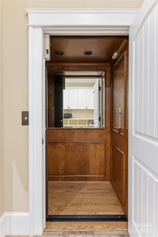 Elevator access to upper level in mud room