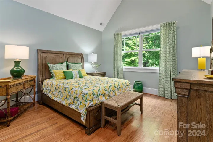 Upstairs bedroom one with vaulted ceiling and plenty of light