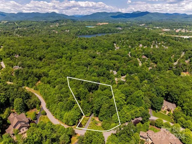 On 2.11 acres in the gated Scott's Ridge of Biltmore Lake