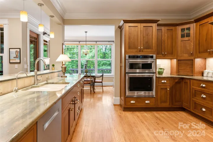 Custom kitchen with Bosch appliances & custom cabinetry
