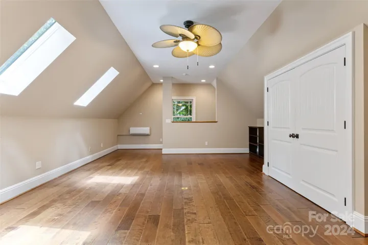 Finished room above detached garage with heat/cool