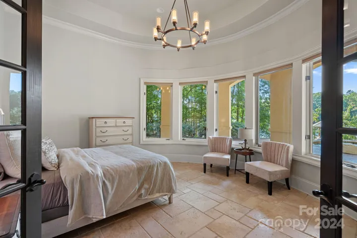 Lower level guest bedroom #4 with lake views.
