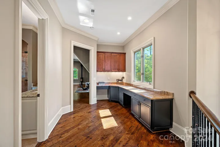 Computer niche/study - upper level. Bonus room to the right, hall full bathroom to the left.