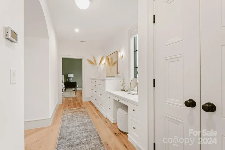 Primary Suite Entrance + Vanity