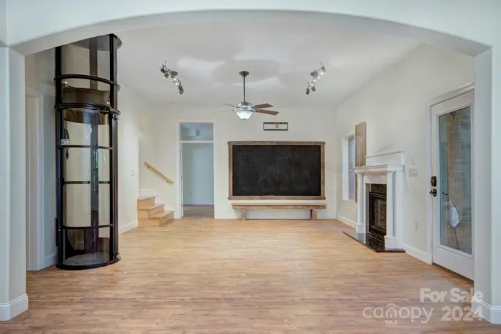 FINISHED BASEMENT/2ND LIVING SPACE W/ GAS FIREPLACE