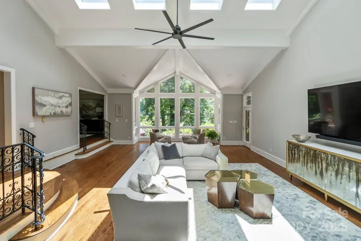 Huge great room with vaulted ceilings and solid pine beams