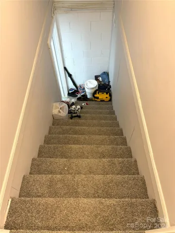 Stairway  connecting main floor and basement.