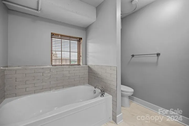 Renovated primary bathroom with garden tub
