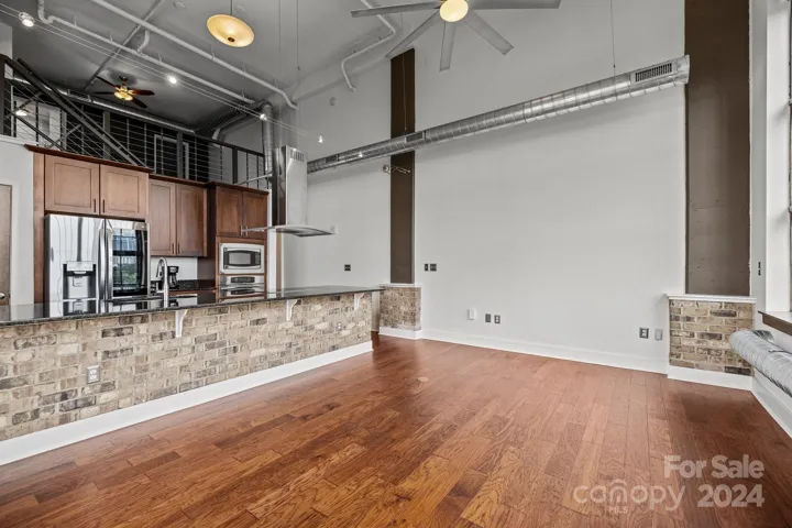 Spacious, bright kitchen and two-story living room