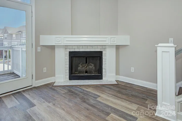 Gas fireplace with marble tile surround