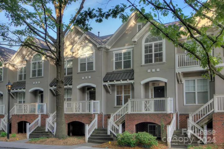 Townhome Style unit with front porch and 2 car tandem garage