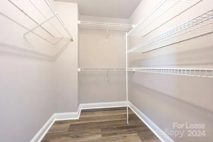 Large walk-in closet in Primary bedroom