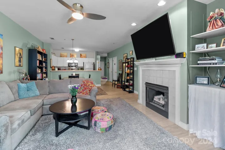 Large open concept living room connects the kitchen and dining area.