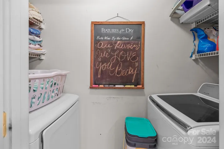 Laundry closet off hall bath
