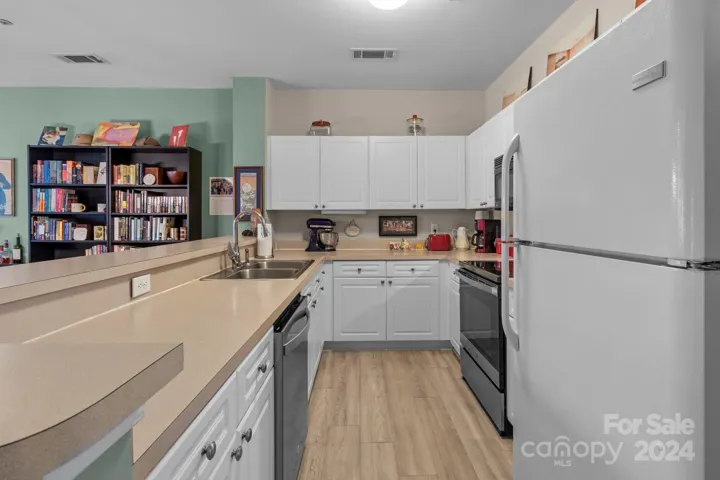 Newer LVP flooring throughout main living area