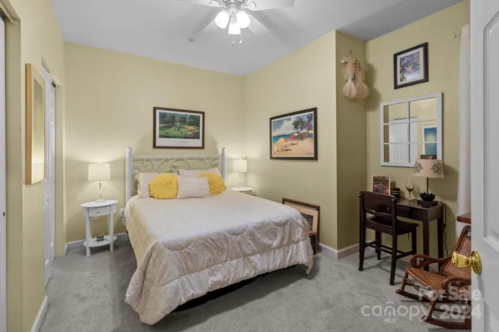 Secondary bedroom with double closets.