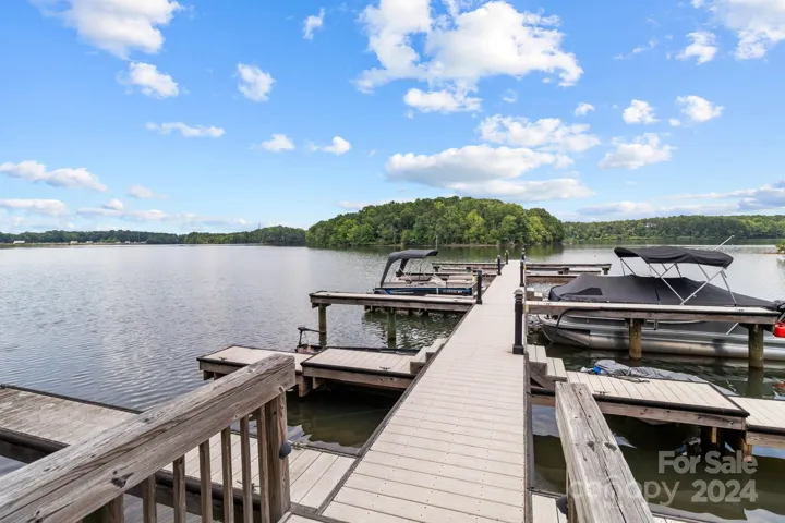Many residents have kayaks and paddle boards stored by the water.