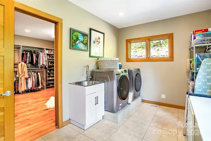 Laundry room connected to dressing closet