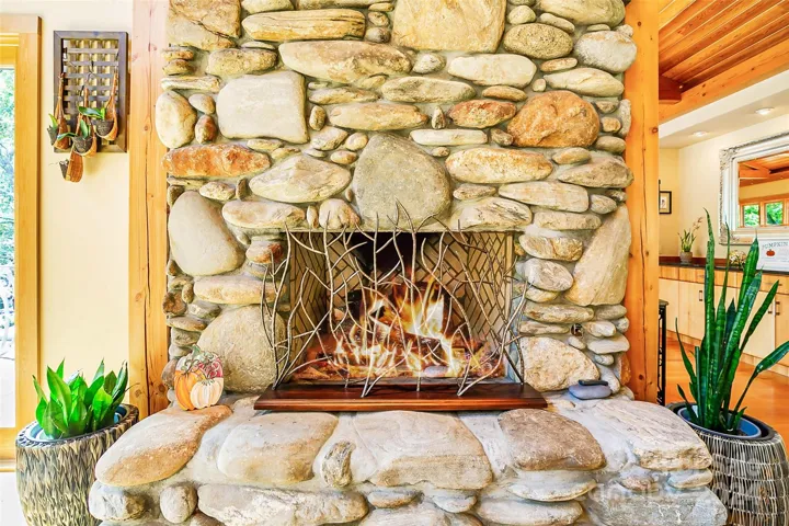 Custom stone fireplace w/heart stone