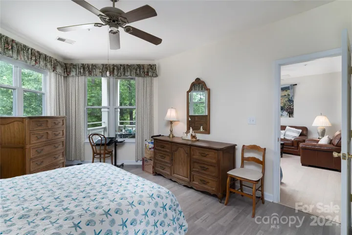 Primary bedroom walks out to the lake,