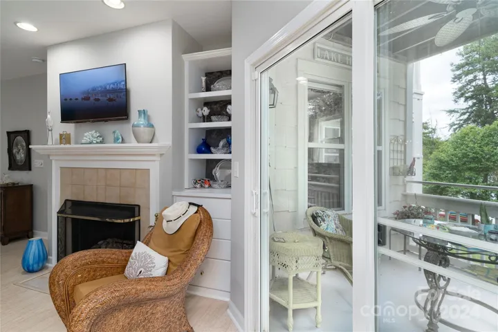 Sliding glass doors lead to a spacious deck