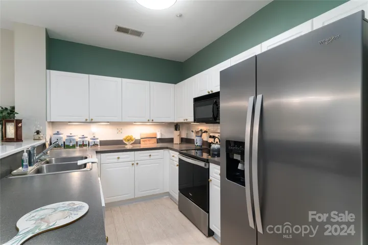 Abundant cabinet space with stainless appliances