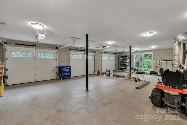Over-sized 3 bay garage for all the vehicles & toys!