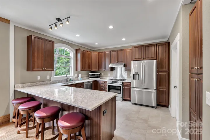 Ample kitchen with gas range