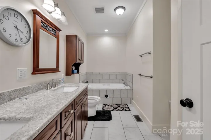 Primary bath directly off the bedroom.