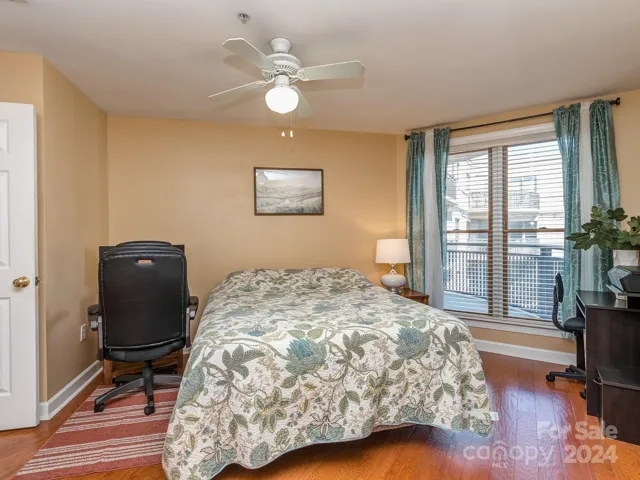 2nd Bedroom with LVP and ceiling fan.