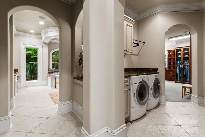 Private primary suite washer and dryer