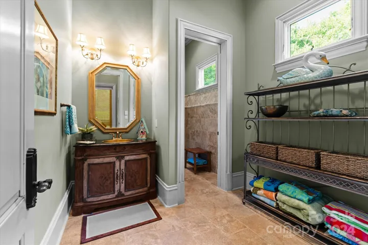 Convenient full bath with pool access