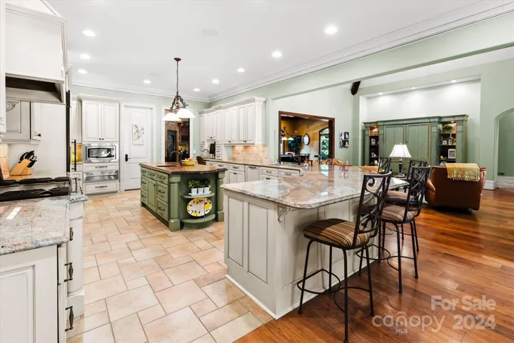 Expansive kitchen includes 2 dishwashers and walk-in pantry