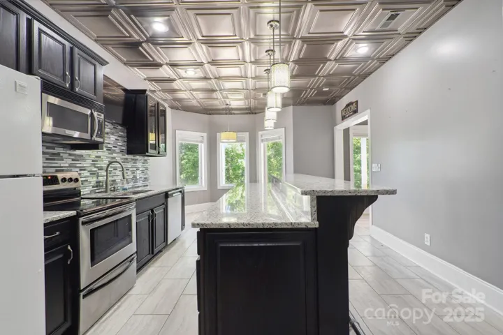 Full secondary kitchen in the basement.