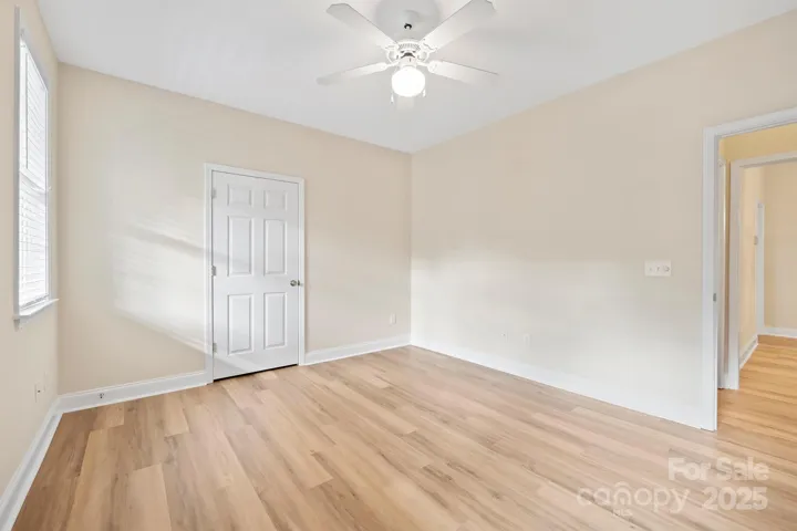 2nd bedroom with new paint and flooring