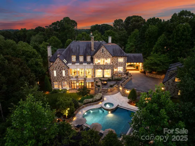 Complete privacy and serenity with 24/7 security in one of Charlotte's most desirable gated community.