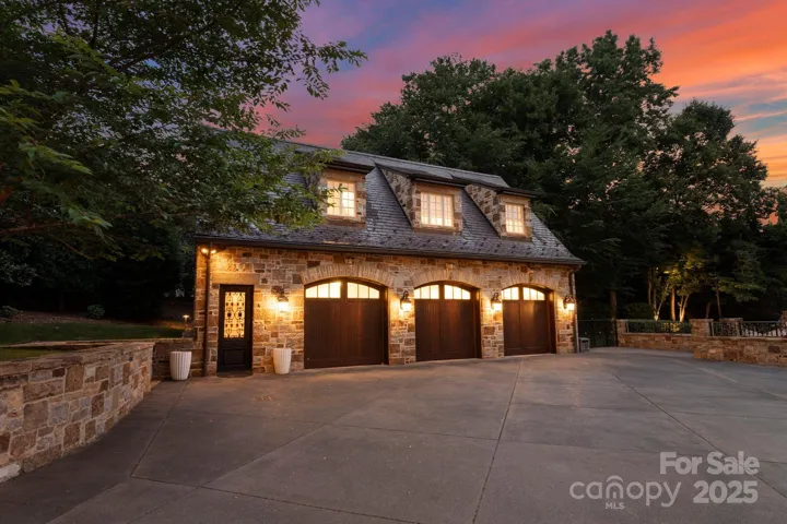 Oversized 3 car garage with 858 sq ft one bedroom apartment above.