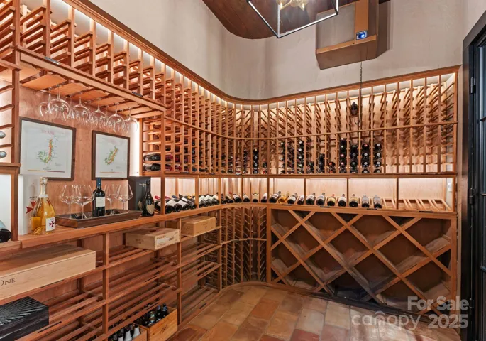 700+ bottle, climate controlled, walk-in wine cellar.