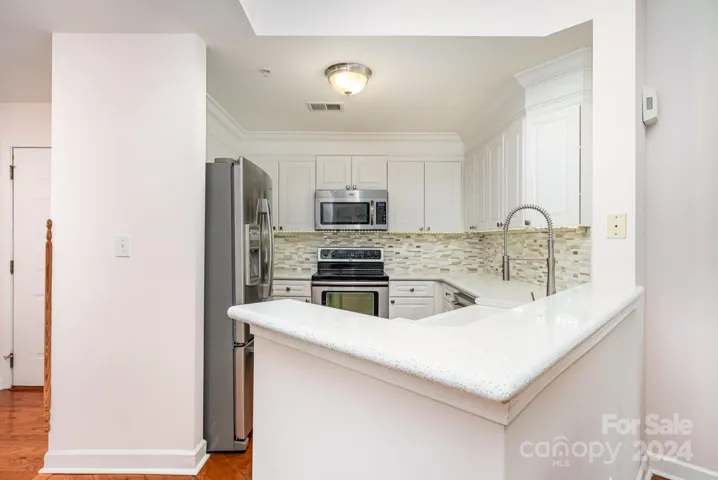 Nice and open kitchen to the gathering spaces