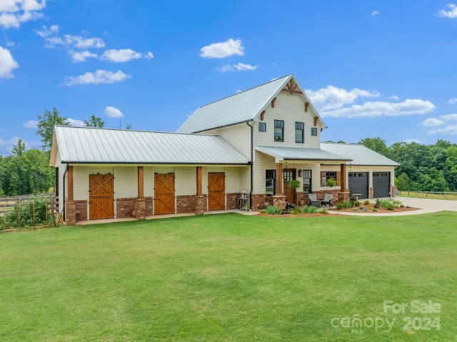 Custom home on 17 acres, built in 2022 with attached 3 stall barn