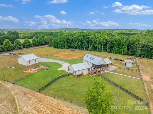 All 17 acres are perimeter fenced with wood and wire mesh.