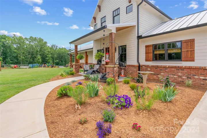 Drip irrigation at house and buried irrigation for yards and front entrance.