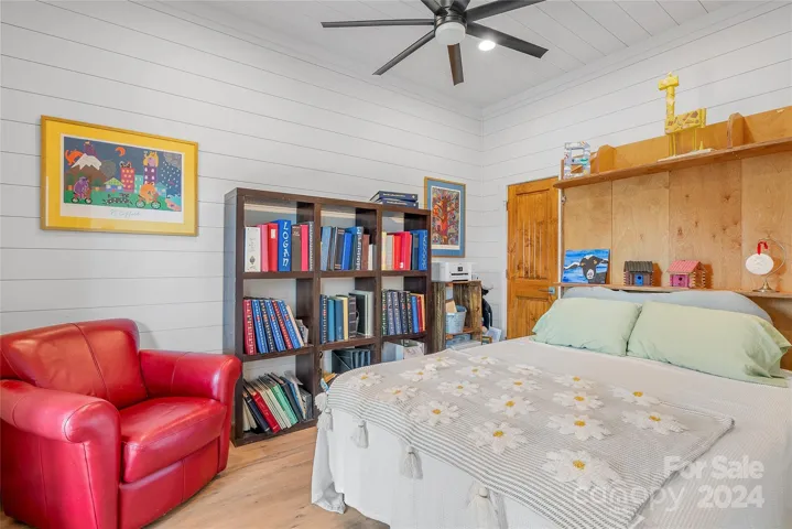 Guest bedroom on main floor includes a Murphy Bed for an easy transition to a home office.