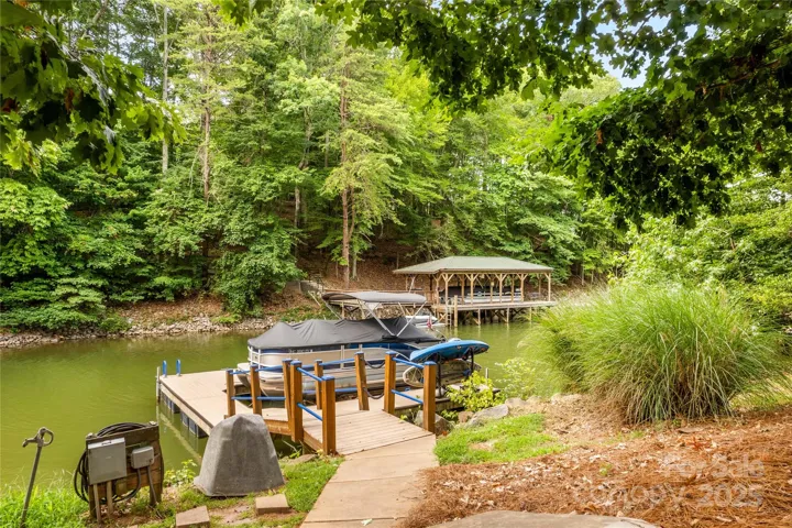 Sidewalk leads to your Private Pier and Boat Slip